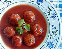 Albondigas con tomate y cebolla